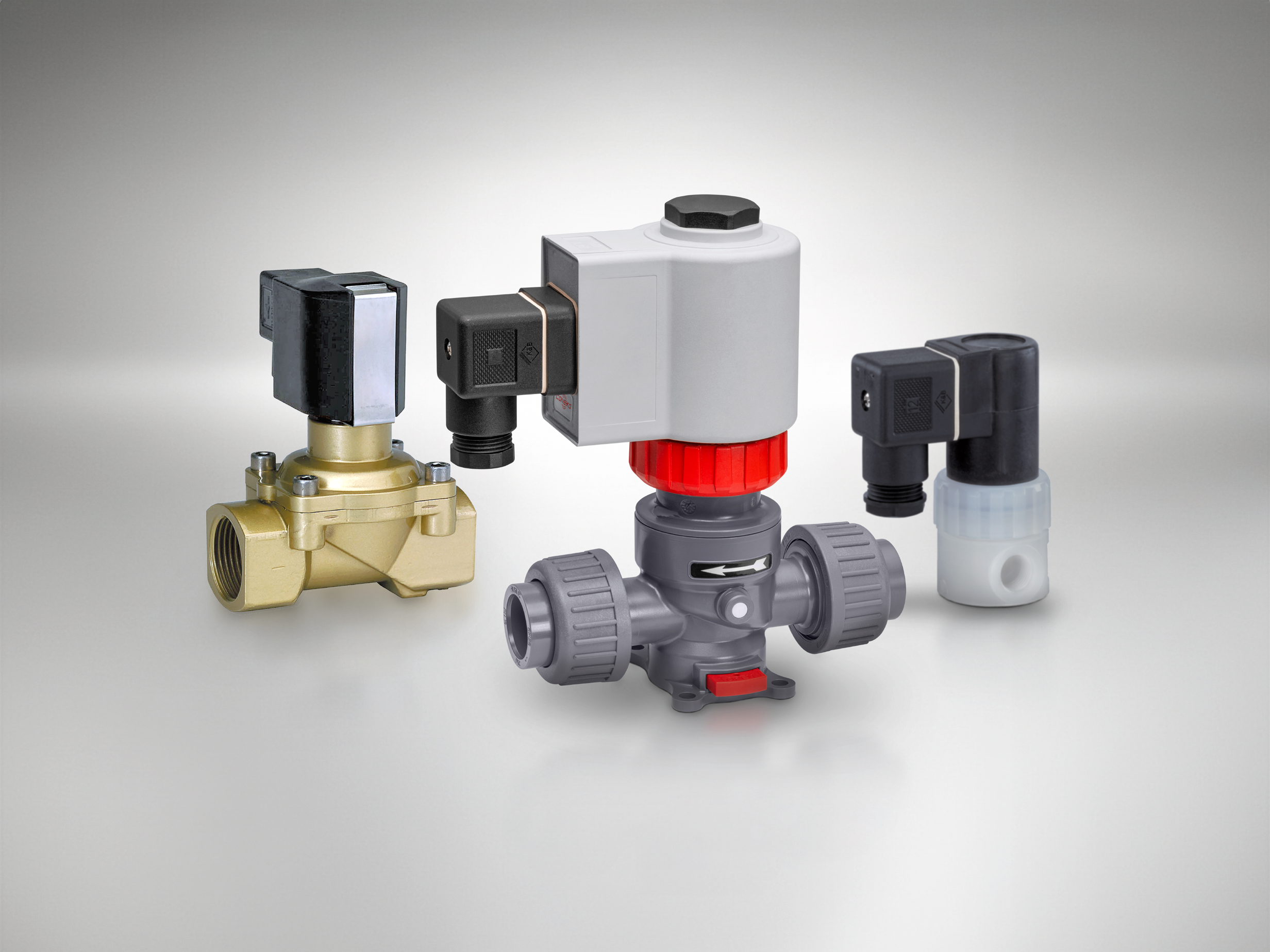 Three different GEMÜ solenoid valves for process applications.