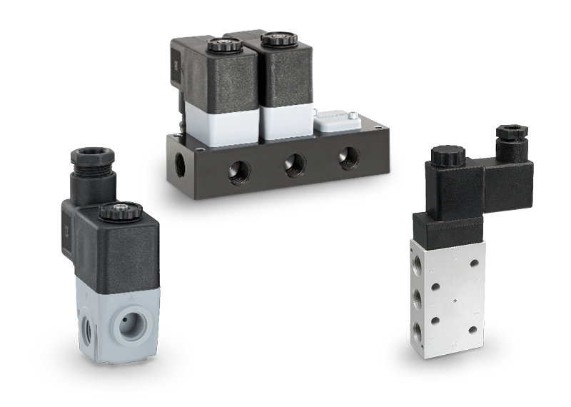 Three GEMÜ pilot valves for controlling pneumatic main valves.