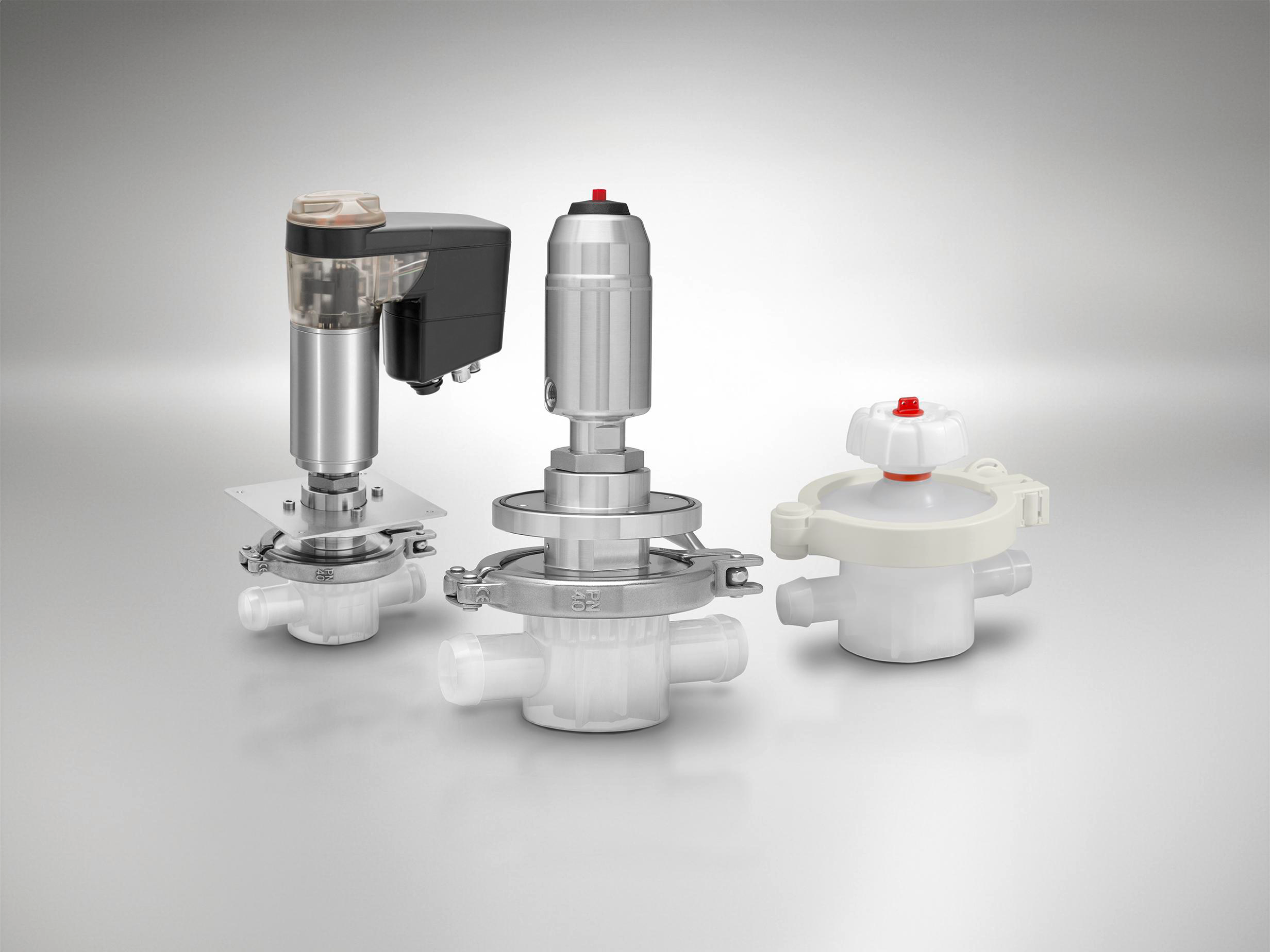 Three GEMÜ Single-Use valves with different actuator solutions.